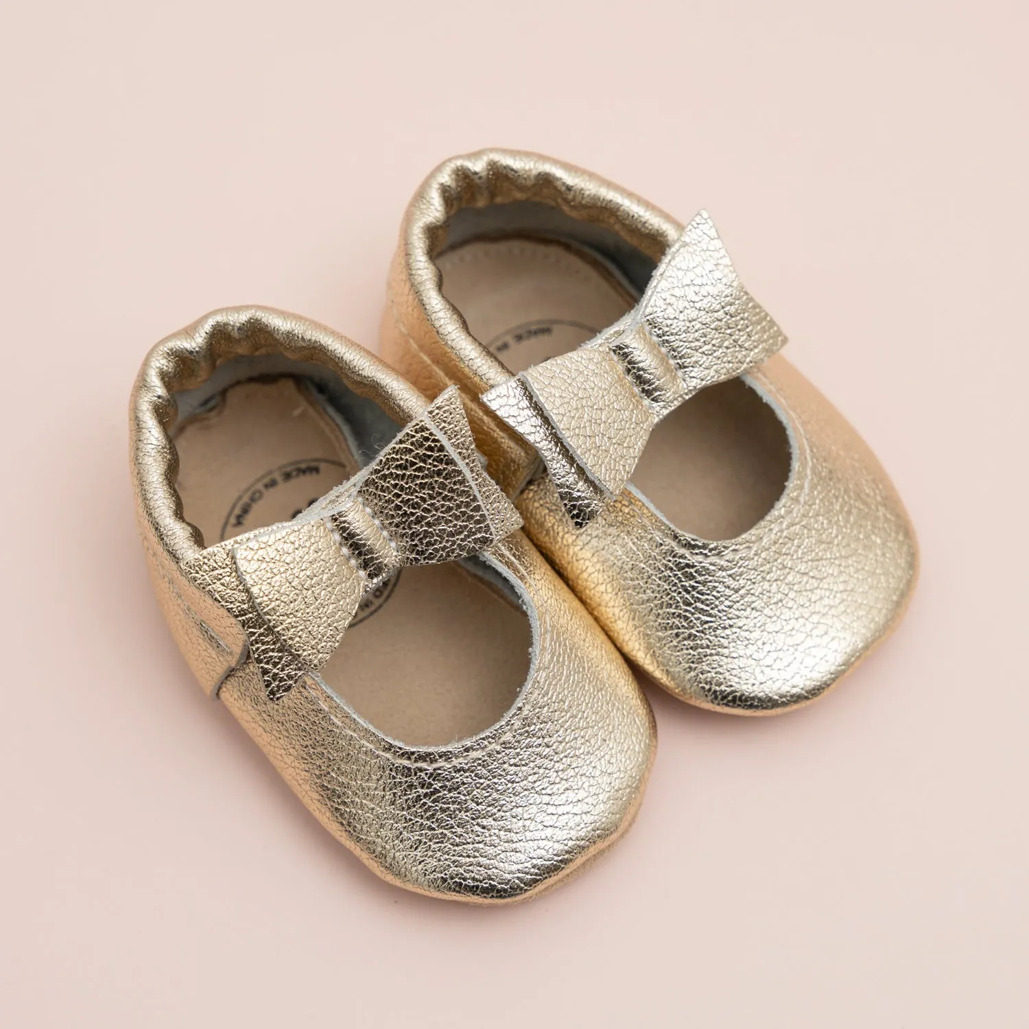 Gold Bow Moccasins