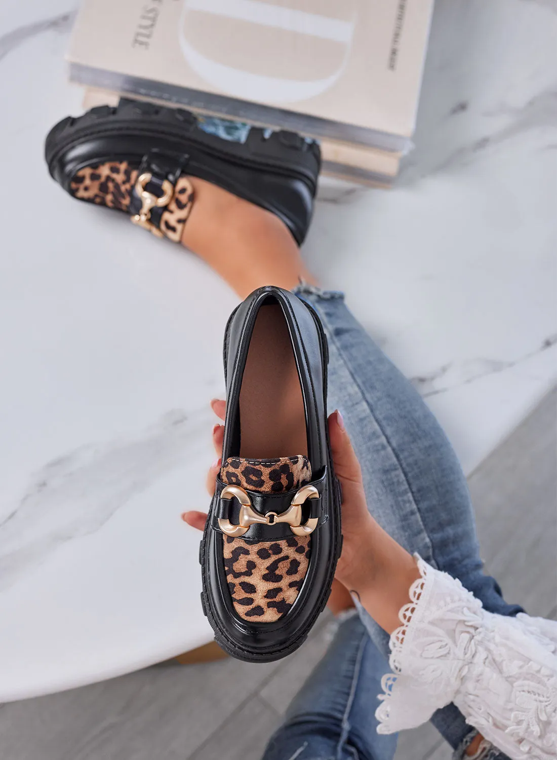 URSULA - Black women's moccasins with a tread sole, leopard insert, and gold buckle